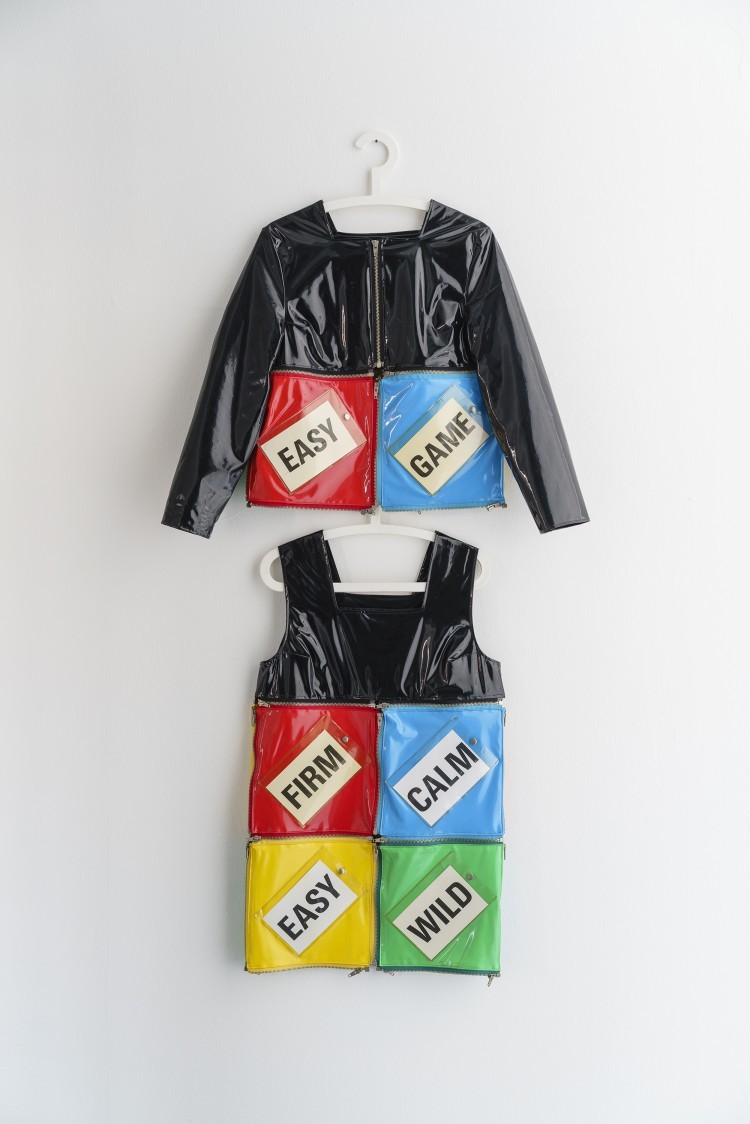 Art Alarm – Stephen Willats: "Multiple Clothing. New Directions. From Riyna Galija", 1992, two tops, one for jacket and coat, the other for dress. Twelve panels. Set of text insert cards. Media PVC, metap zips, card and mixed media, 93,4 x 58 cm